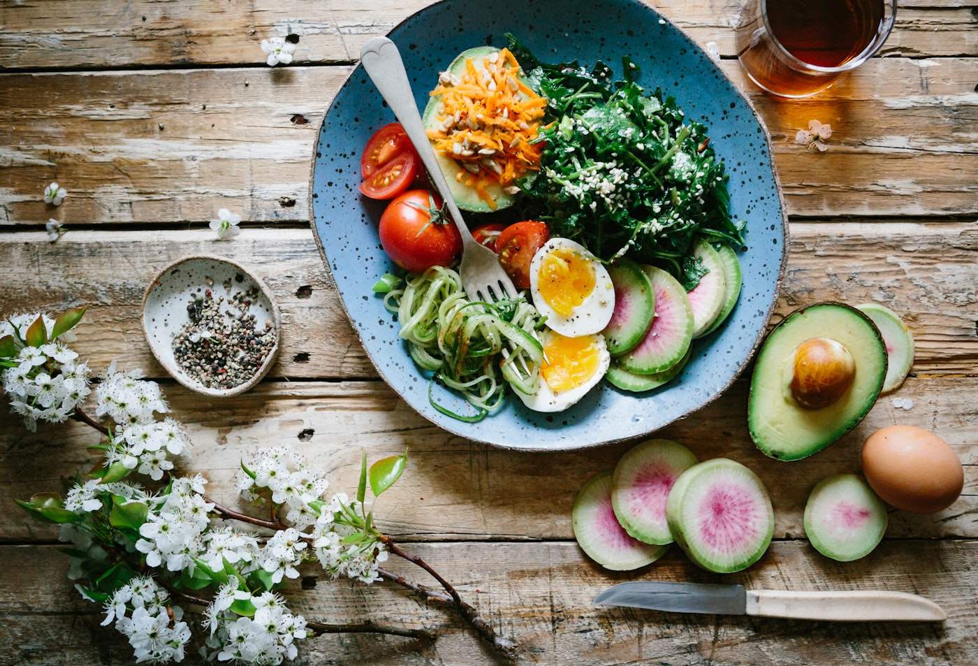 Protein-forward meal bowls on a table.